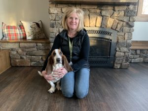 Traci with therapy dog, Lucy